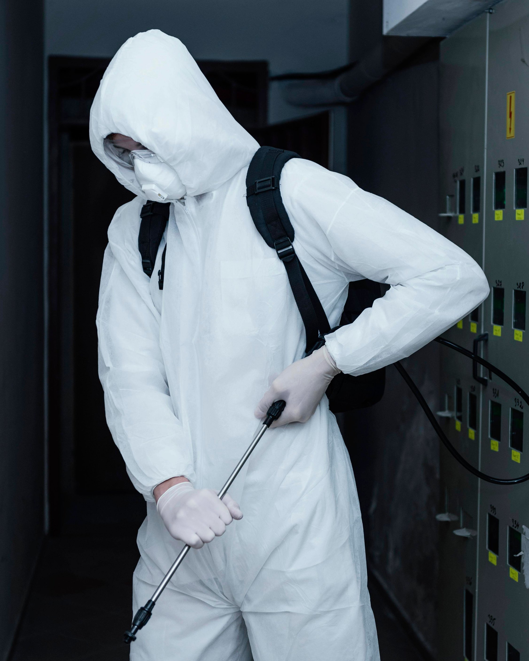 person-wearing-prevention-suit-against-bio-hazard